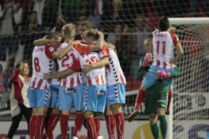Los jugadores del Lugo celebran la victoria.