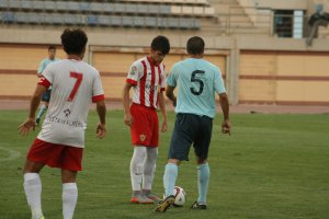 Rojiblancos del Almería b y celestes del C. D El Ejido la pasada temporada en un amistoso.
