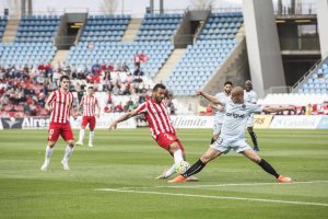 Michel en una jugada con Tejera.