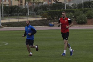 Esteban Saveljich corriendo con Jesús Roche.