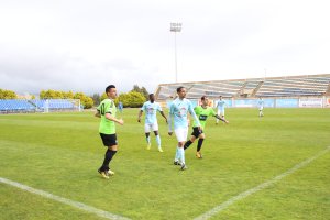 Emilio Cubo y Mango durante un partido liguero.