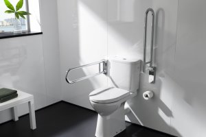 Baño adaptado con barras de Roca.