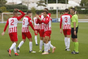 Celebración de la victoria frente al Malagueño.
