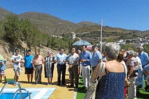 El cura, el diputado y el alcalde en el acto de la semana pasada