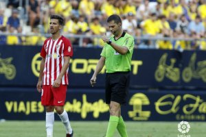 Trujillo Suárez con Juan Carlos Real.