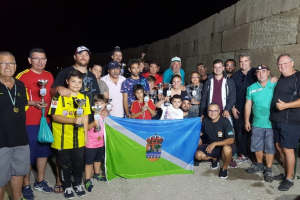 Los participantes en el concurso de pesca.