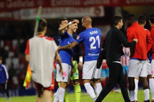 Nano, Fidel y Fernando celebrando la permanencia en el Anxo Carro.