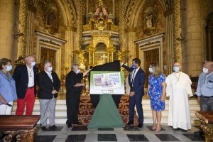 Presentación del cupón con la imagen de la Virgen del Mar.