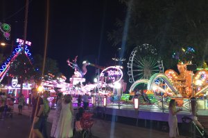 Imagen de varias atracciones en el recinto ferial, en una edición pasada de la Feria de Almería.