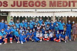 Foto de familia en el Palacio de los Juegos Meditarráneos en una jornada maratoniana.