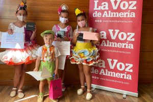 Los ganadores del Concurso de Trajes Flamencos 2021 en la categoría infantil y la más salerosa.