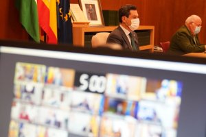 Juanma Moreno y Jesús Aguirre, durante la reunión.