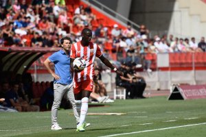 Rubi y el lateral Mendes en el Almería-Rayo.