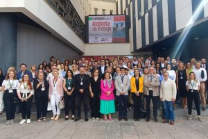 Foto de familia de ponentes y asistentes