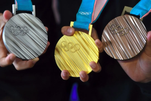 Medallas de oro, plata y bronce en unos juegos.