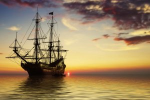 Una recreación de un barco pirata al atardecer. Fotografía de Depositphotos