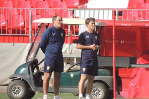 Rubi con su ayudante en el entrenamiento.