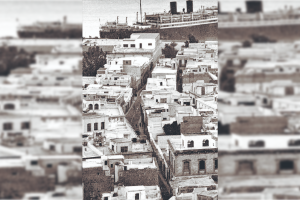 La calle de la Reina cuando aún no habían llegado los edificios modernos para dinamitar todo su esplendor de adarve antiguo.