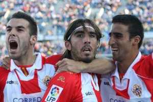 Chico Flores con Negredo y Pellerano.