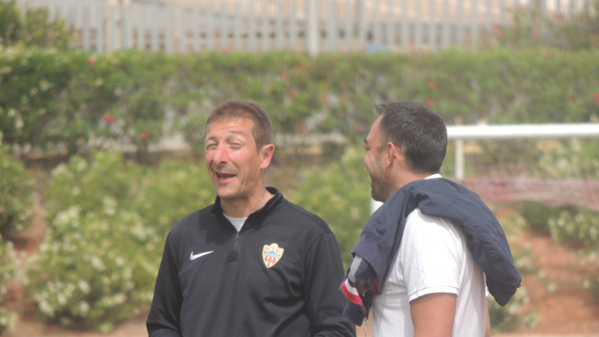 Ramis, con el director deportivo.