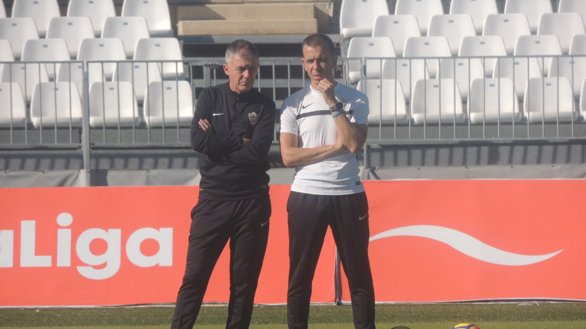 Lucas con Campos, el preparador físico.