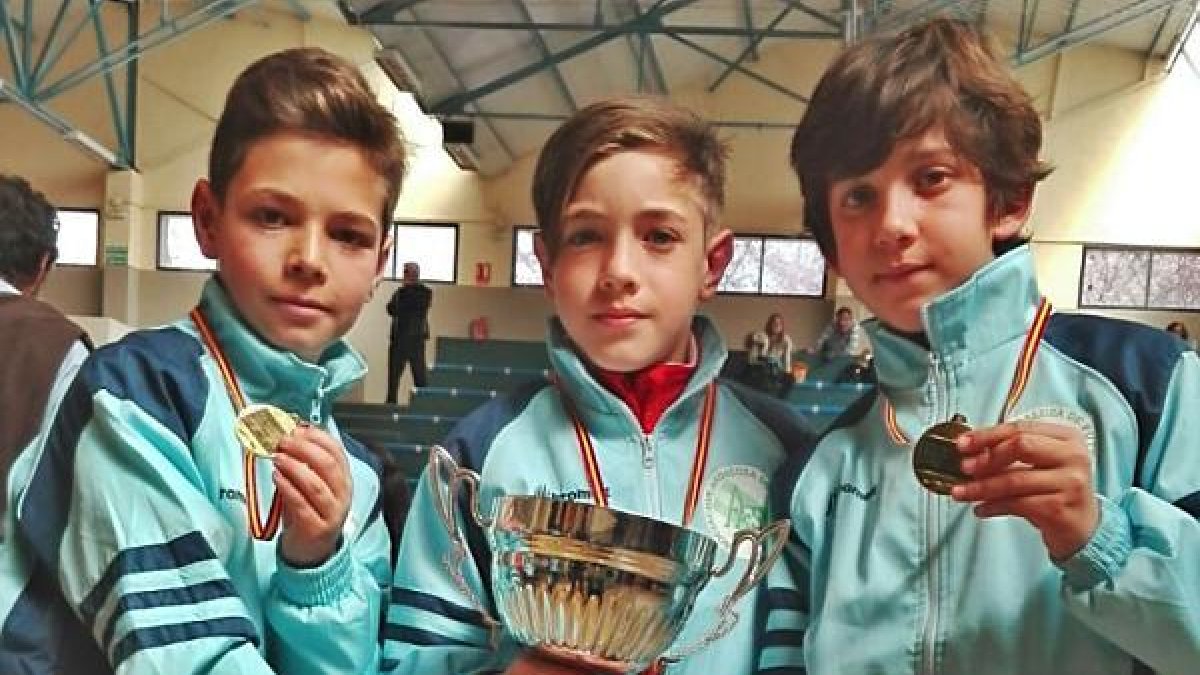 Los tres almerienses campeones de España.