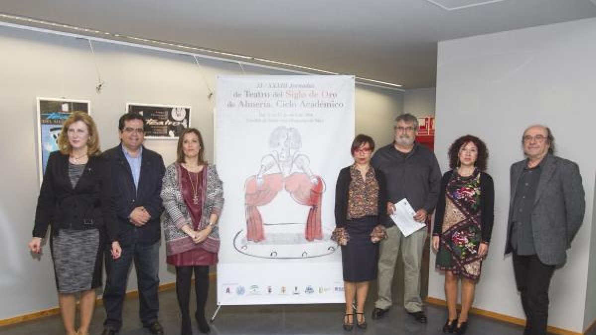 Representantes de las instituciones implicadas, el autor del cartel y el director de las Jornadas.