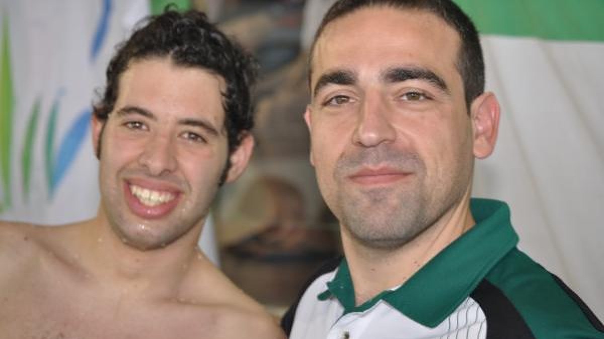 Tejada (izquierda) con su entrenador.