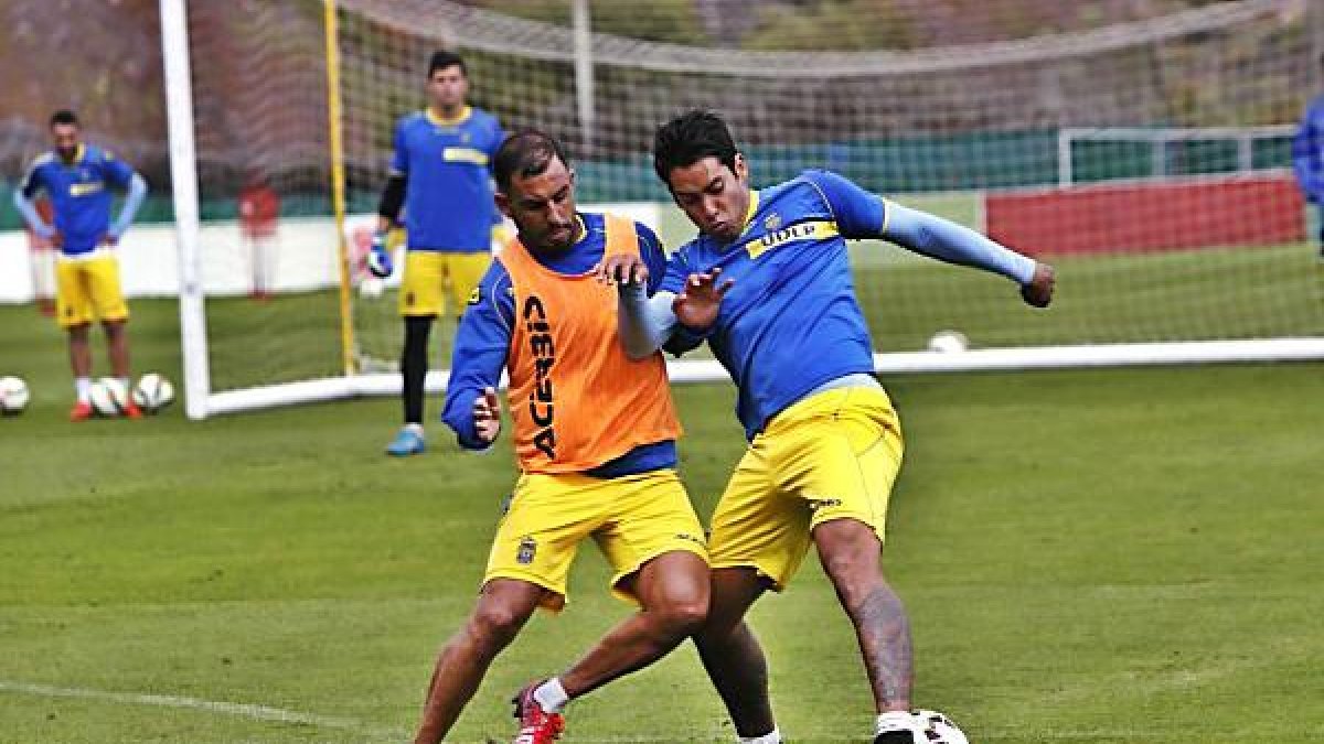Los dos jugadores en una sesión de entrenamiento.