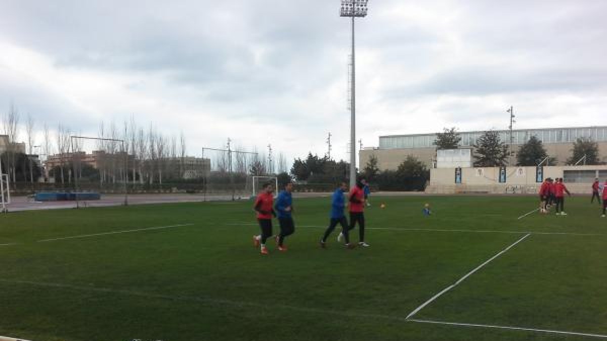 Ximo y Chuli entrenando al margen.