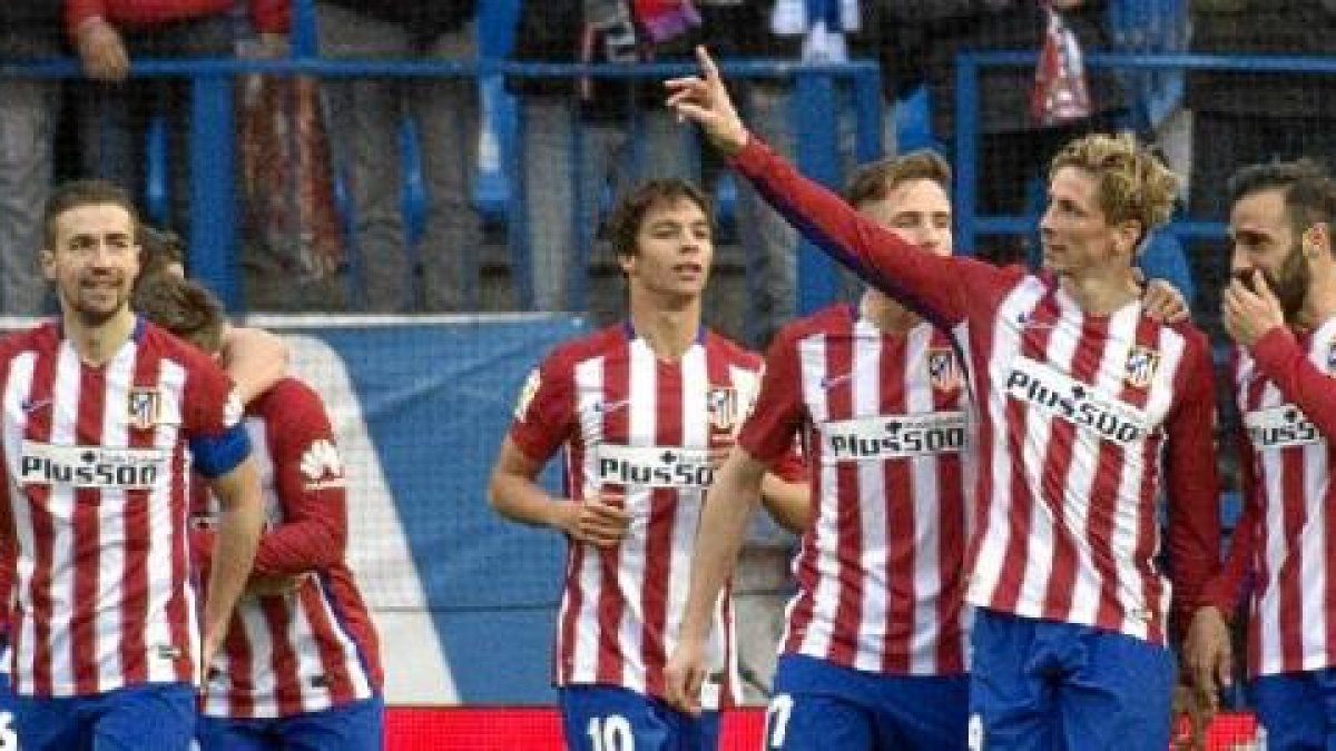 Los colchoneros celebrando la victoria.