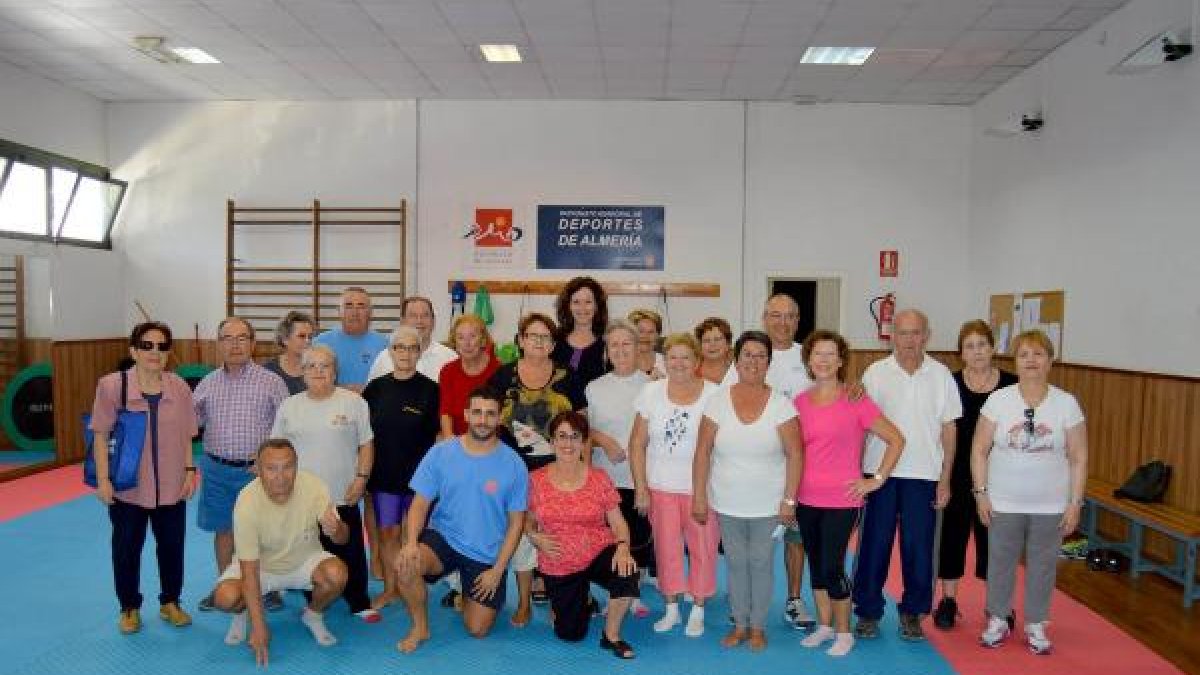 María Vázquez con los mayores deportistas.