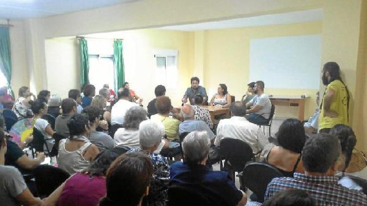 Asamblea para coordinar la llegada de inmigrantes.