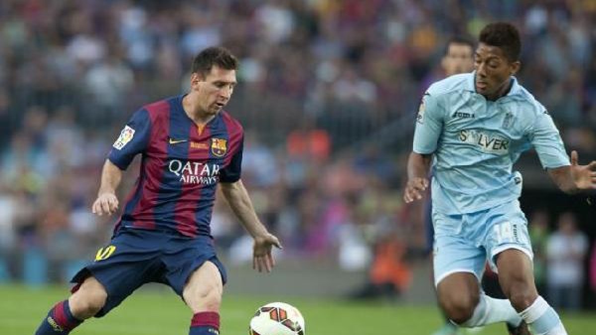 Leo Messi y Eddy Silvestre en el Camp Nou.