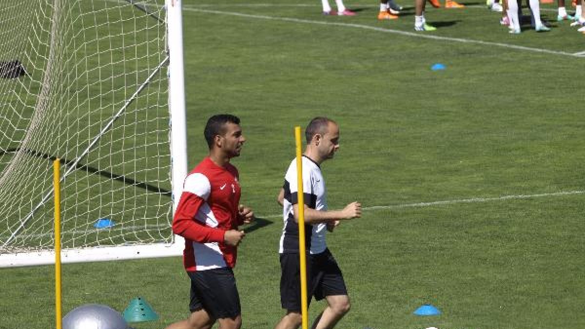 Michel Macedo y el recuperador Enrique Portaz, este jueves.
