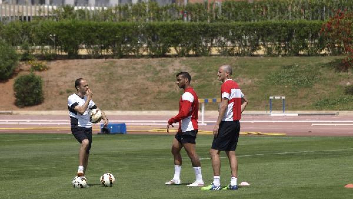 Soriano y Michel, con el recuperador Enrique Portaz.