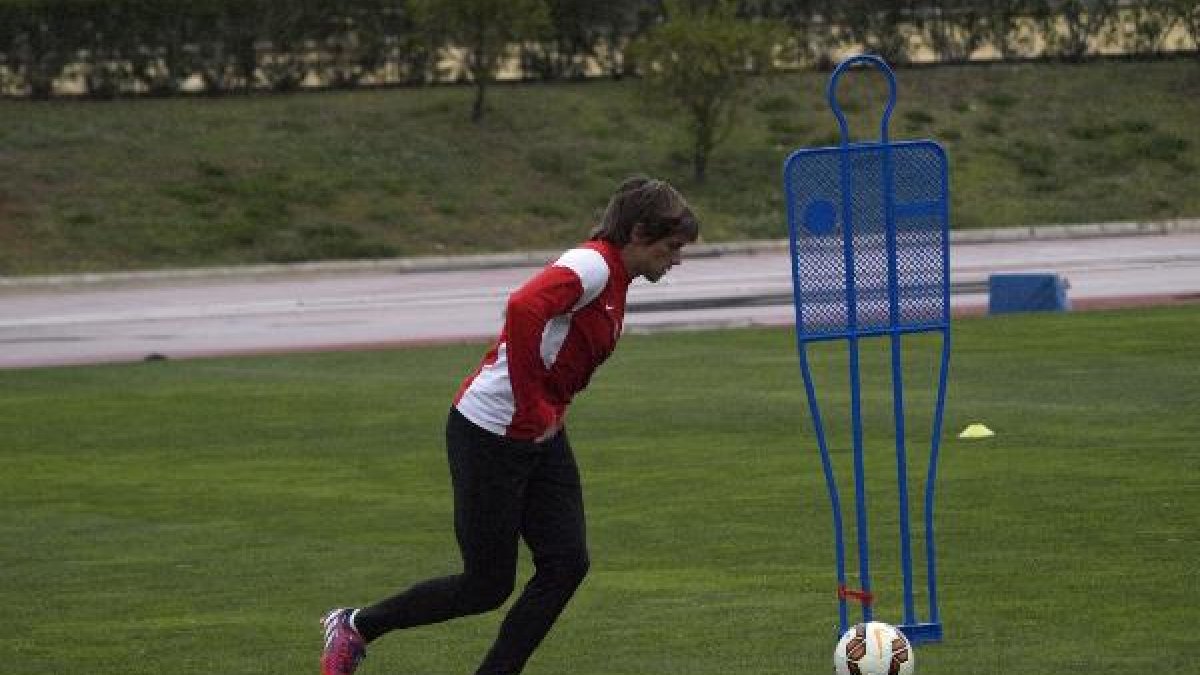 Dubarbier en el calentamiento con los compañeros.