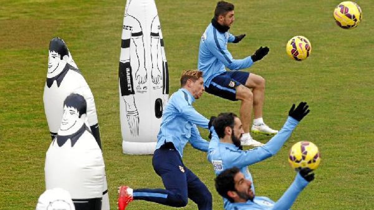 Los jugadores del Atléti tienen que aplicarse para lo que les viene encima.