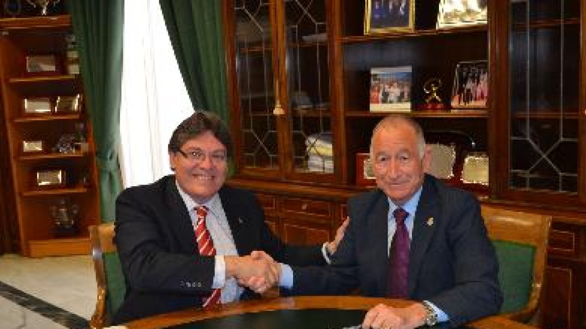 firma entre Mena y Amat de un convenio anterior sobre el parque