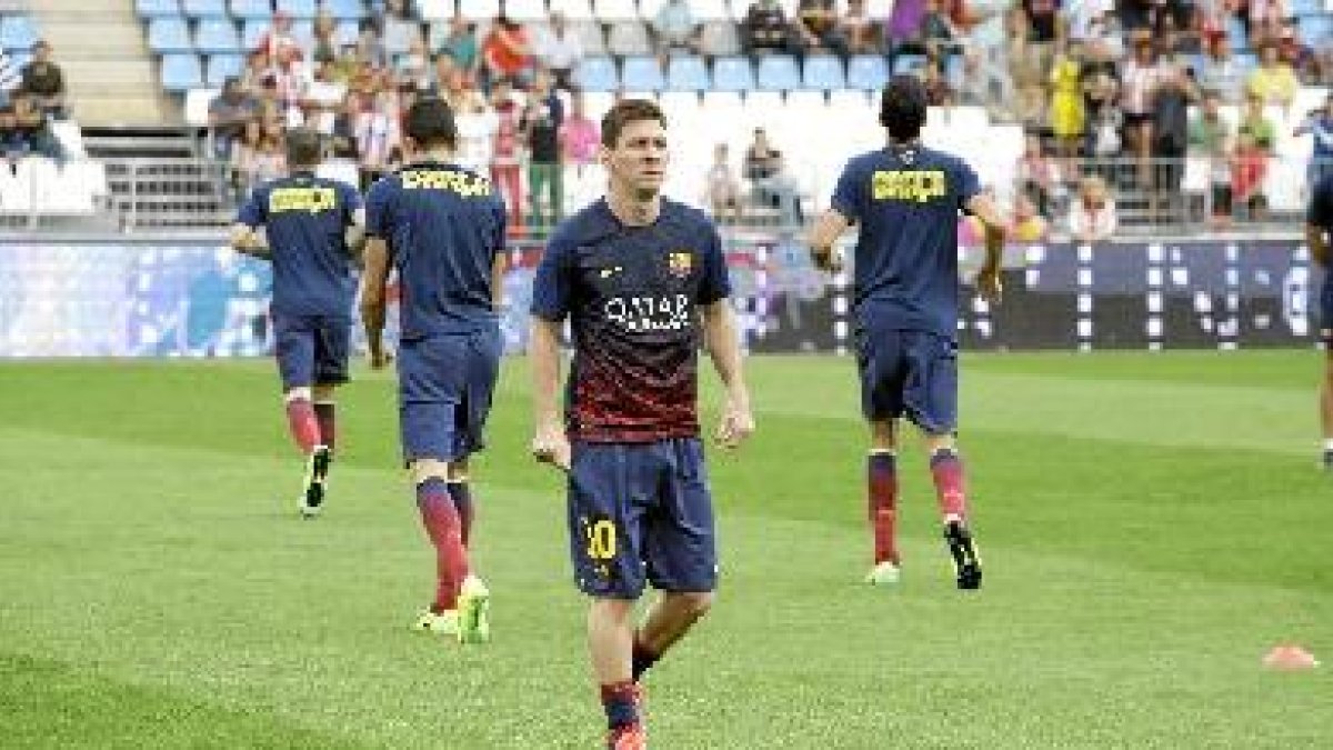 Leo Messi, calentando en el Mediterráneo.