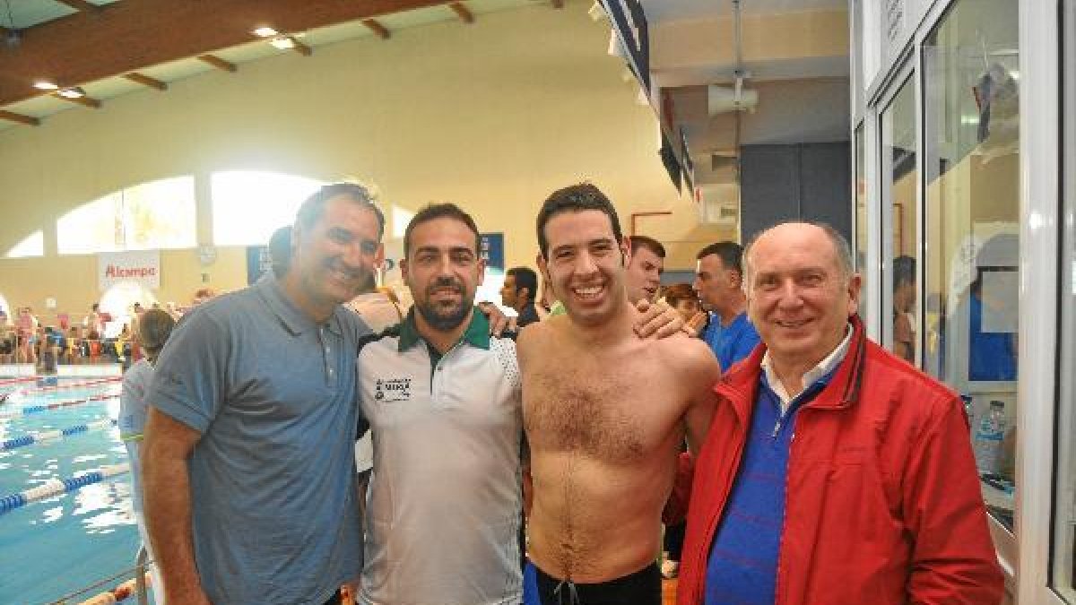 Tejada con sus entrenadores, Palacios y Casimiro.