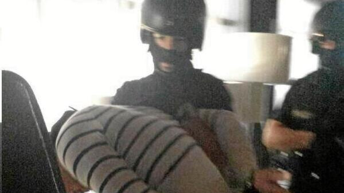 Imagen del presunto asesinoo,469px);}