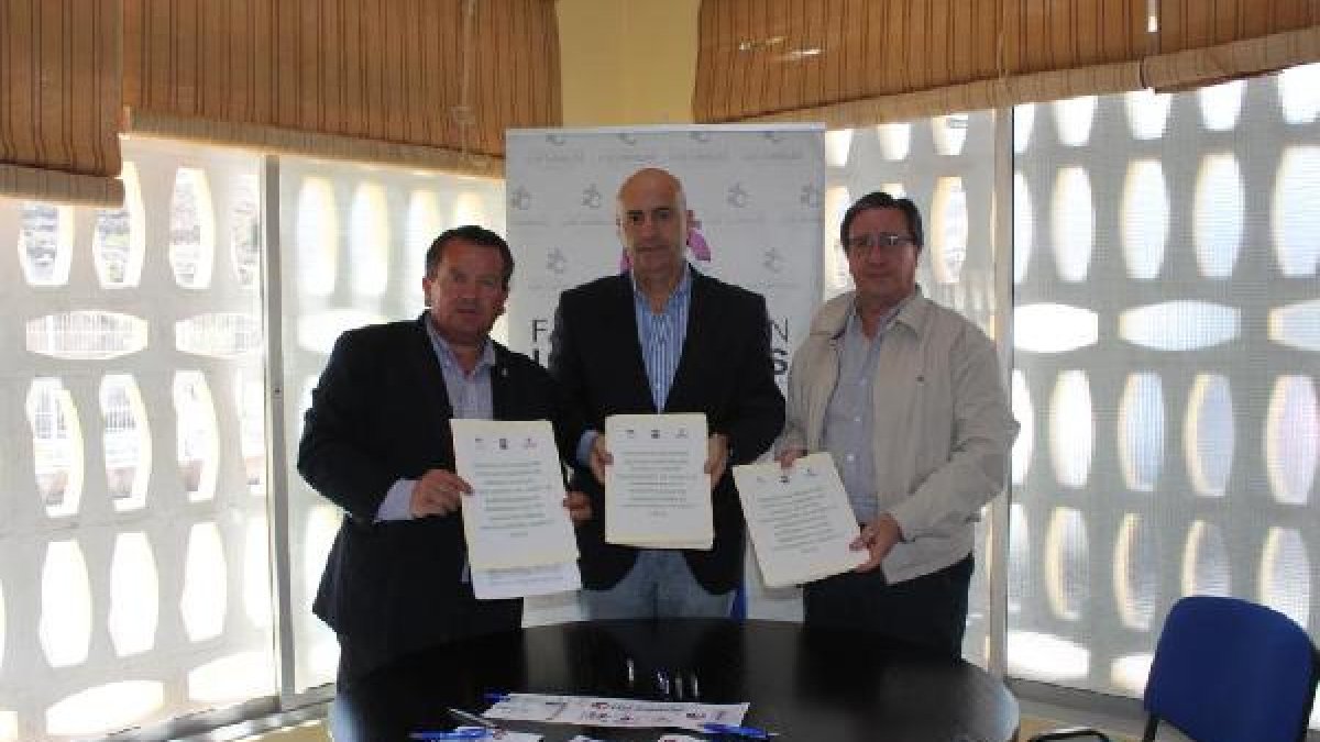 Firma del convenio entre las partes involucradas.e;clip:rect(46
