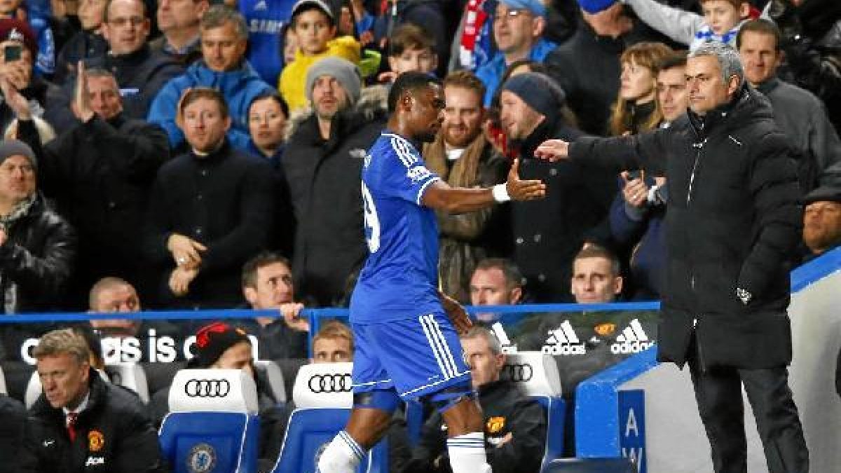 Samuel Etoo y José Mourinho.o,469px);