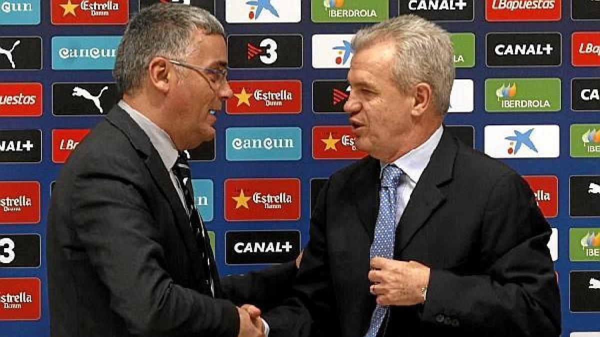 Un apretón de manos puede bastar para el acuerdo.e;clip:rect(46