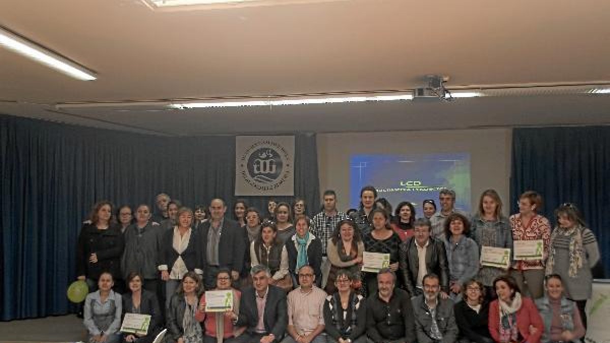 Foto de grupo de los padres y madres en el salón de actos del IES Al-Ándalus.tyle>.apqj{po