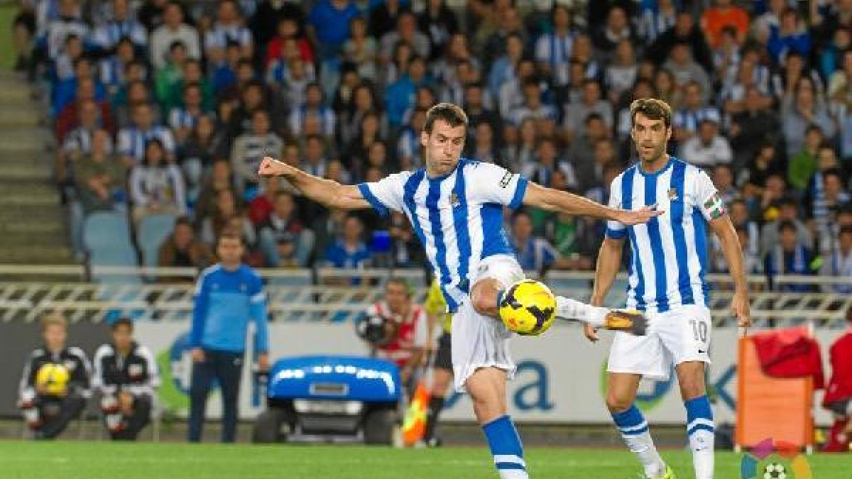 Imanol Agirretxe junto a Xabi Prieto.
