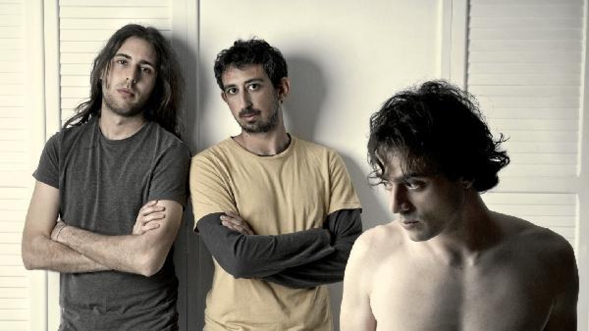 Imagen promocional de la banda de rock.x,auto,a