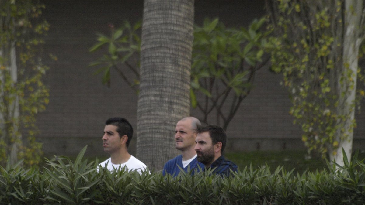 Soriano y Juanito siguiendo el partido.