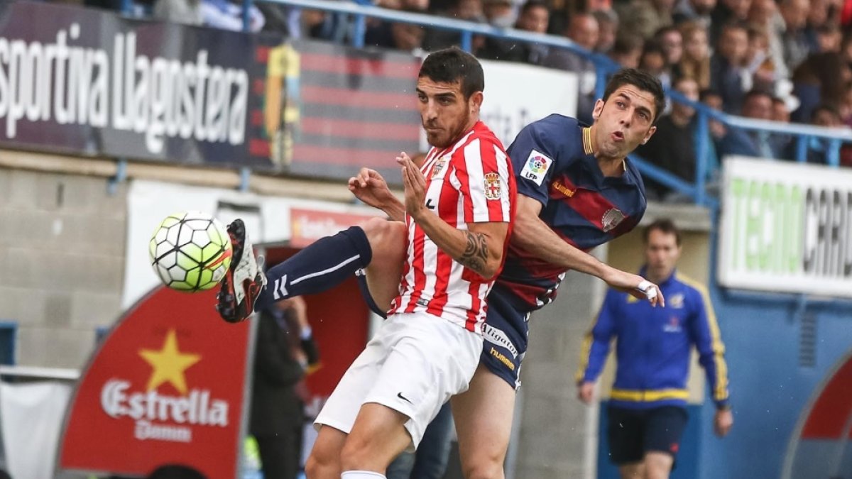Juanjo con Fran Vélez en el Llagostera-Almería.